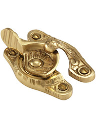 Floral Victorian Sash Lock In Polished Brass.